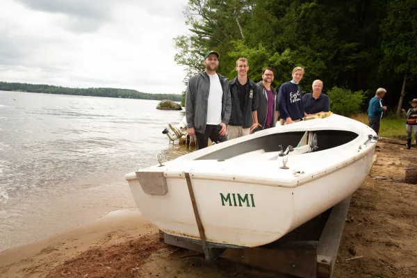 This group at Eagle Camp shows the scenic and boating possibilities of island camping.