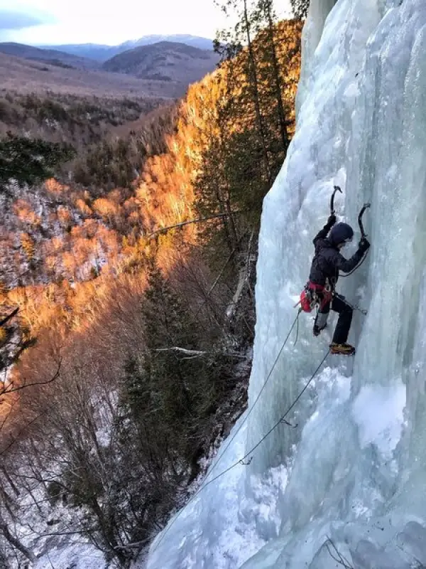 An ice climber leading.