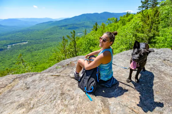 Hiker and dog on Flume Knob