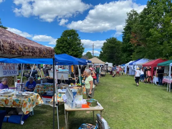 Jay Day attendee talking to vendor