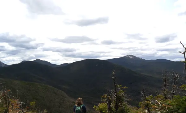 A hiker on a mountain top