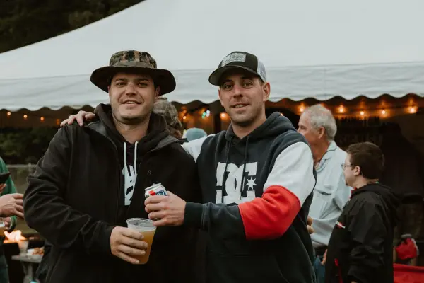 Two men cheers drinks