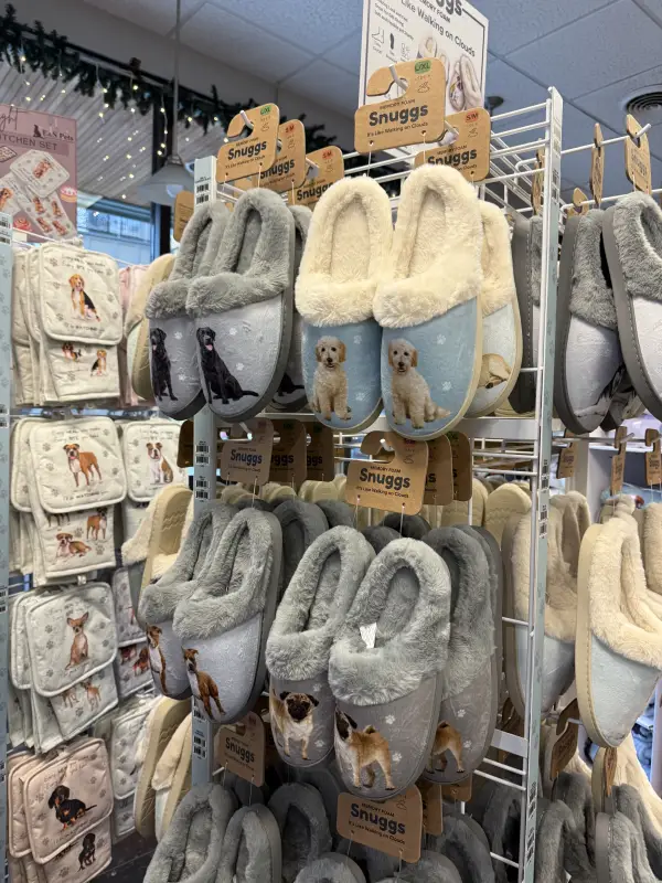 Christmas slippers with puppies in santa hats