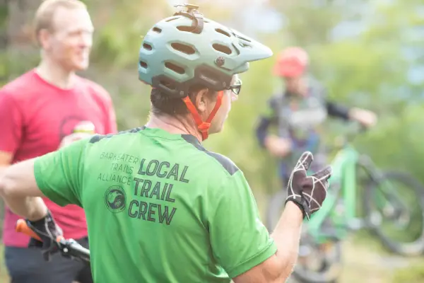 Trail crew chatting with people