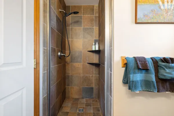 The shower space at Lake Placid Pinehill Townhouse.