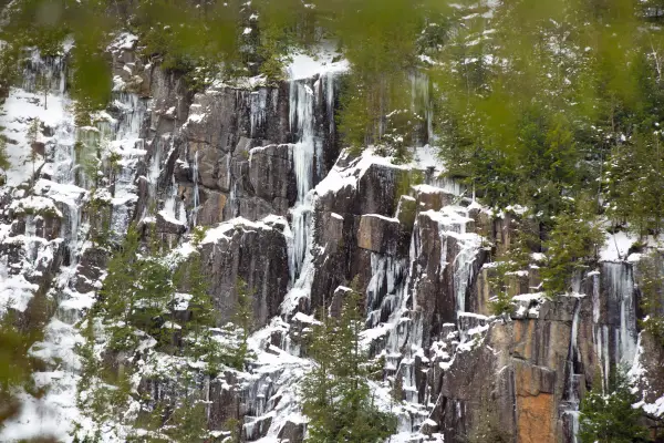 The rock wall makes fine iciciles.