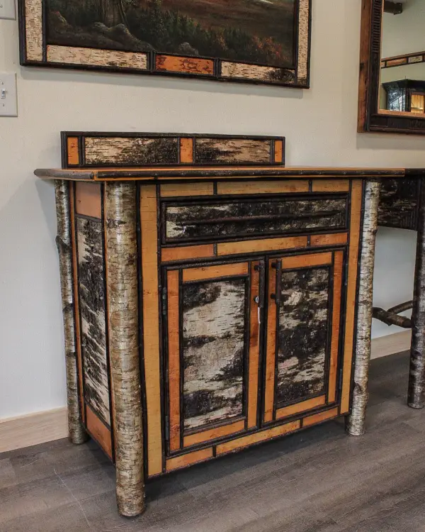 White birch cabinet with wooden stick pulls