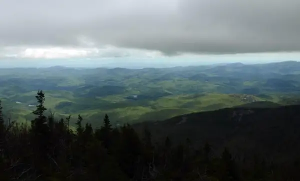 A mountain view with low clouds