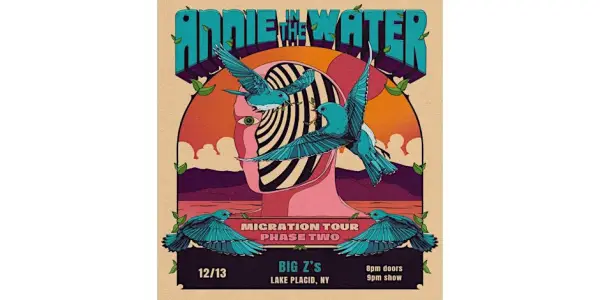 Poster for Annie in the Water's Migration Tour Phase Two at Big Z's in Lake Placid, NY on December 13th.  The poster features stylized artwork of a face, birds, and a sunset.