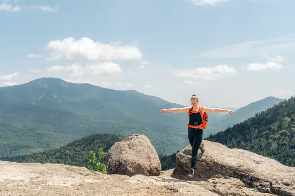 A hiker on a rocky summit