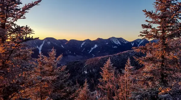 An early morning view of mountains in the winter