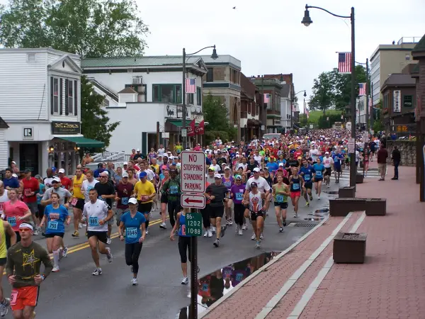 Lake Placid Main Street is packed with runners