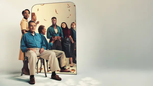 All My Sons promo shot of Bryan Cranston sitting in front of mirror with woman behind him and more people reflected in mirror