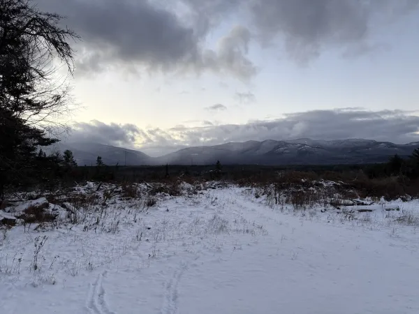 the high peaks stun from the wintery field