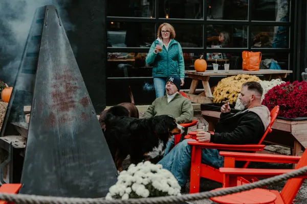 The outdoor dog-friendly space with fire towers makes it fun year round.  Photo Credit to A. Kelly.