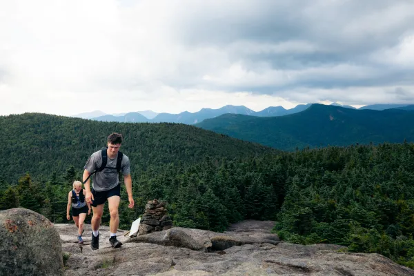 Two people going up Cascade's ridgeline