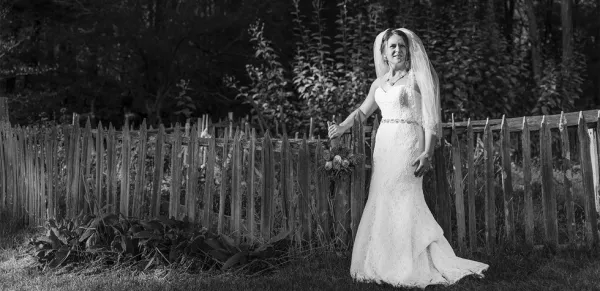 A black and white photo of a bride.