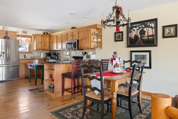 The spacious kitchen and dining nook at Lake Placid Pinehill Townhouse.