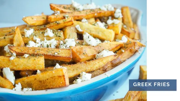 Hand-cut fries topped with Feta and spices for Greek Fries