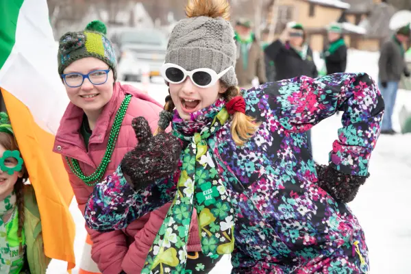 Kids dressed up in festive attire as they await the parade