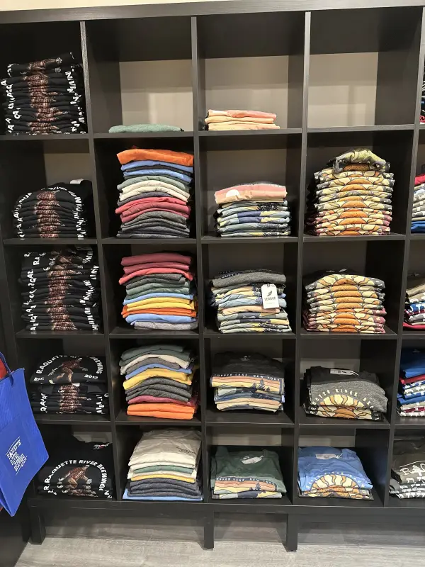 Shelves of branded shirts
