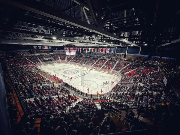 1980 Herb Brooks Arena looking down at the ice set up for a hockey game with a full crowd in the seats