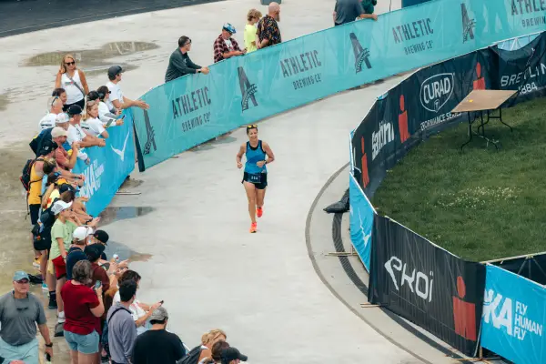 Ironman athlete approaching finish on oval