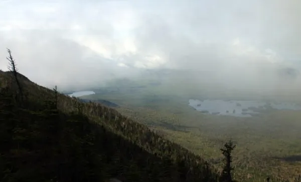 A view of a large lake from high in the mountains