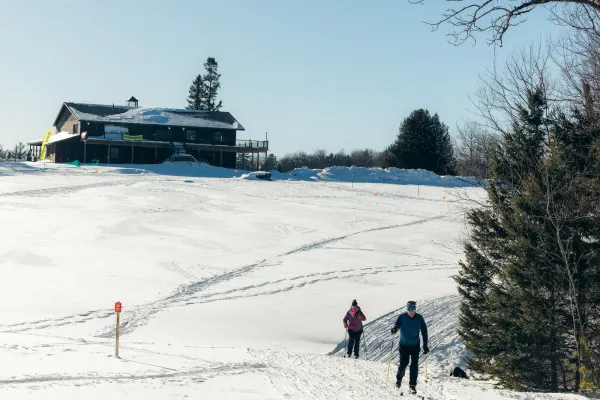 Two people cross-country skiing at Scotts Cobble in Lake Placid, NY.