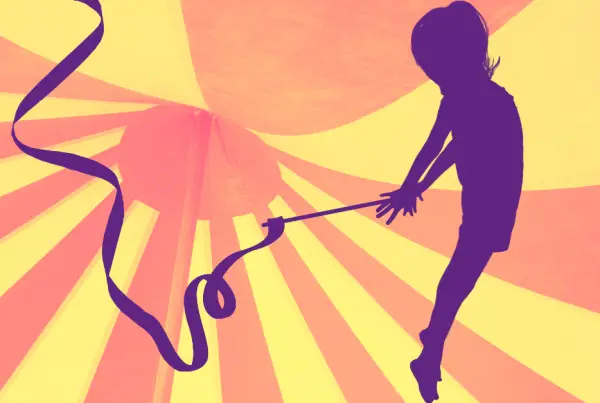 Silhouette of a child performing rhythmic gymnastics with a ribbon under a circus tent.