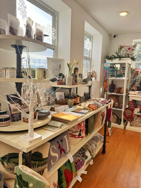Shelves of decor at The Peak Boutique at The Mirror Lake Inn.