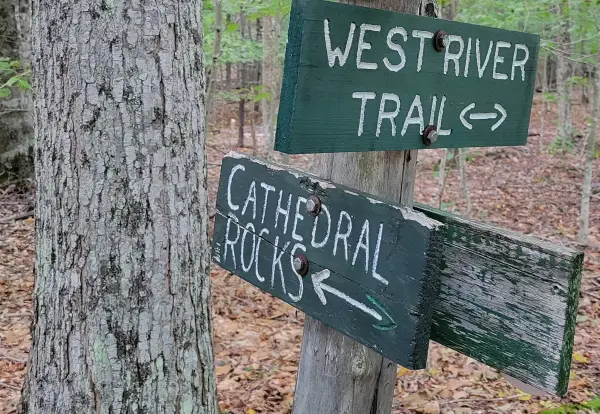 A wooden sign for Cathedral Rocks