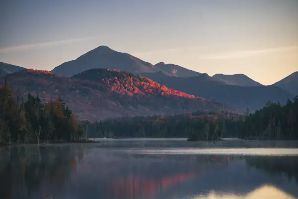 Tall mountains in pink morning light
