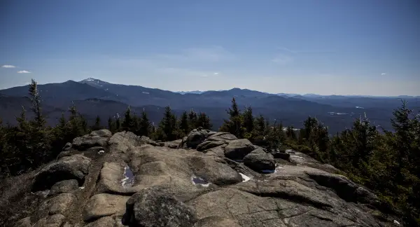 A bald summit with a commanding view in any season.