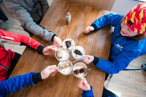 Family cheers with hot cocoa
