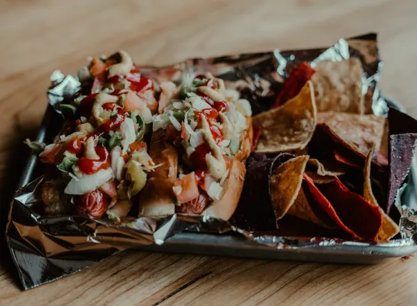 Fully loaded hot dogs with tortilla chips.  Photo Credit to A. Kelly..