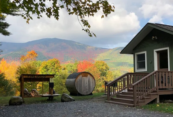 View of mountains in fall with house and suana