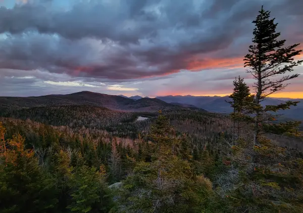An extensive mountain view at sunset