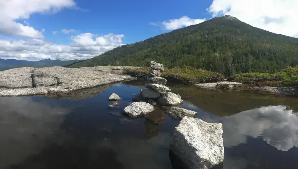 The route follows the Marcy Dam Trail.