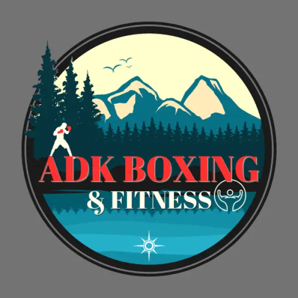 Logo for ADK Boxing & Fitness, depicting a boxer in front of a mountain landscape.