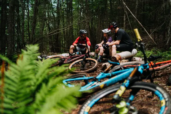 A group of mountain bikers resting