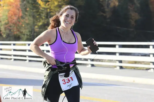 Runner smiles at the camera