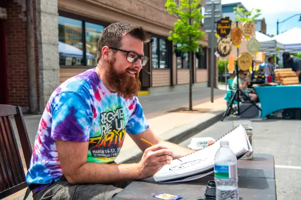 Artist on Park Street in Tupper Lake