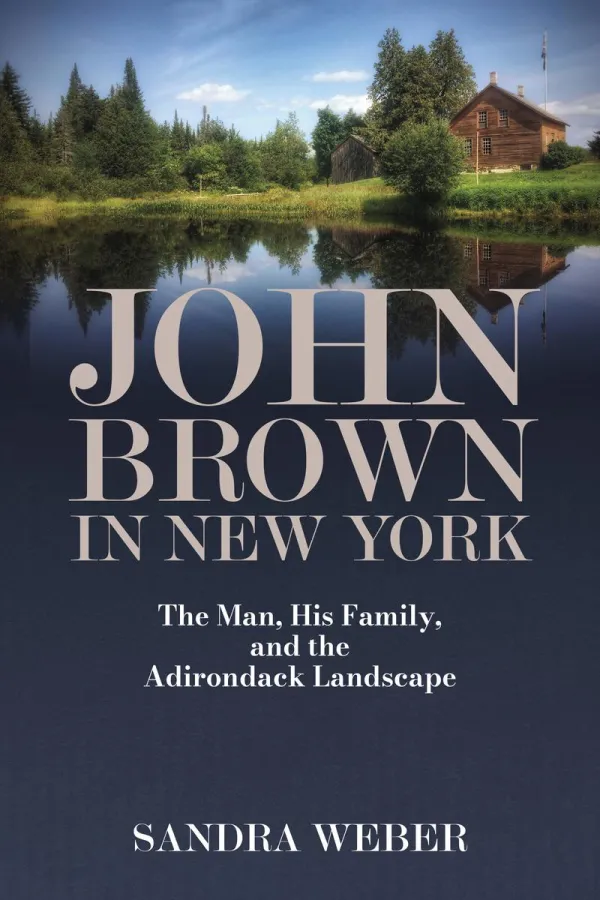 Book cover of "John Brown in New York" with photo of John Brown Farm at the top fading into a navy background