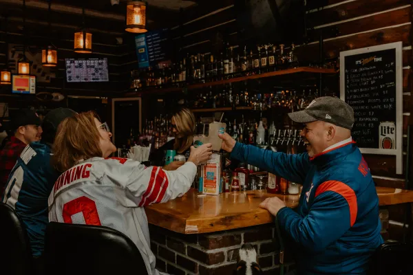 Patrons enjoy game day at the bar.  Photo Credit to A. Kelly.