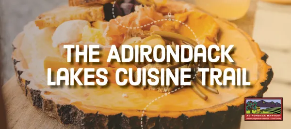 A graphic that reads "The Adirondack Lakes Cuisine Trail."