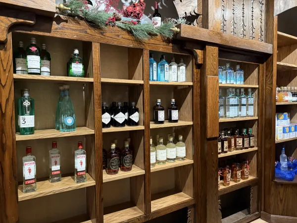 Shelves with various bottles of white spirits at Nippletop Liquors.
