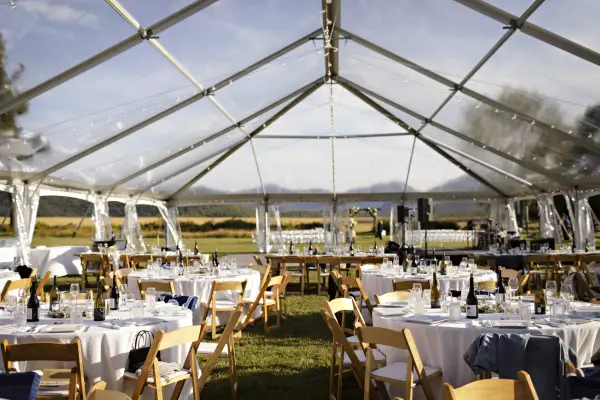 A clear tent allows the surrounding to be the decor
