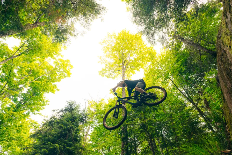 A mountain biker getting air