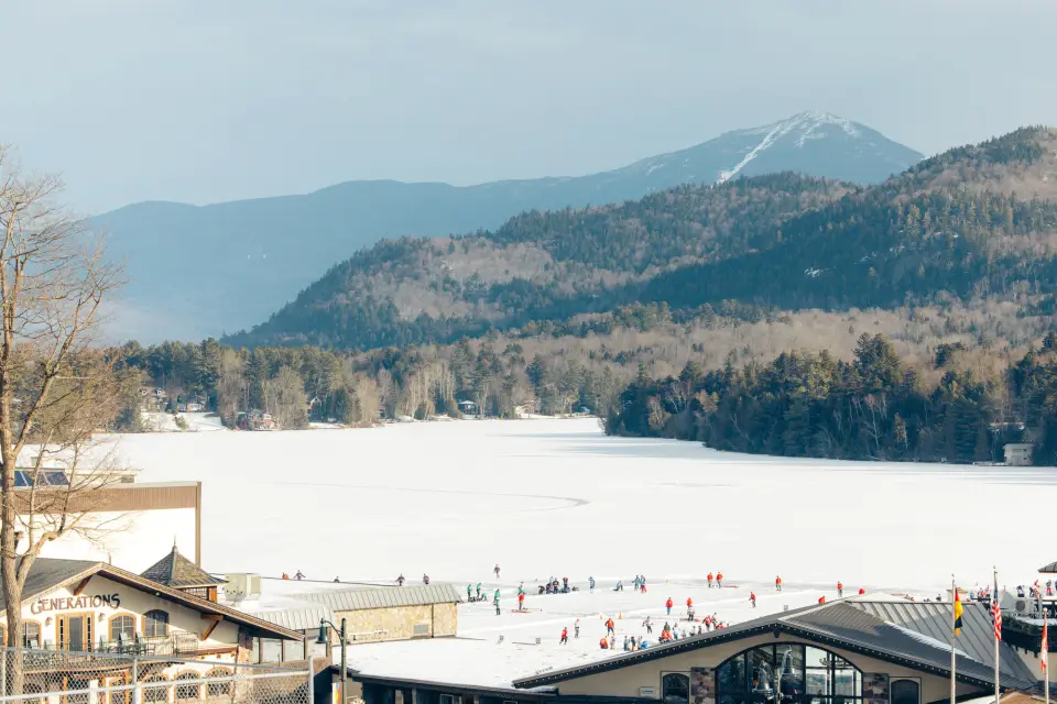 Mirror Lake in the winter with Whiteface Mountain in the background.